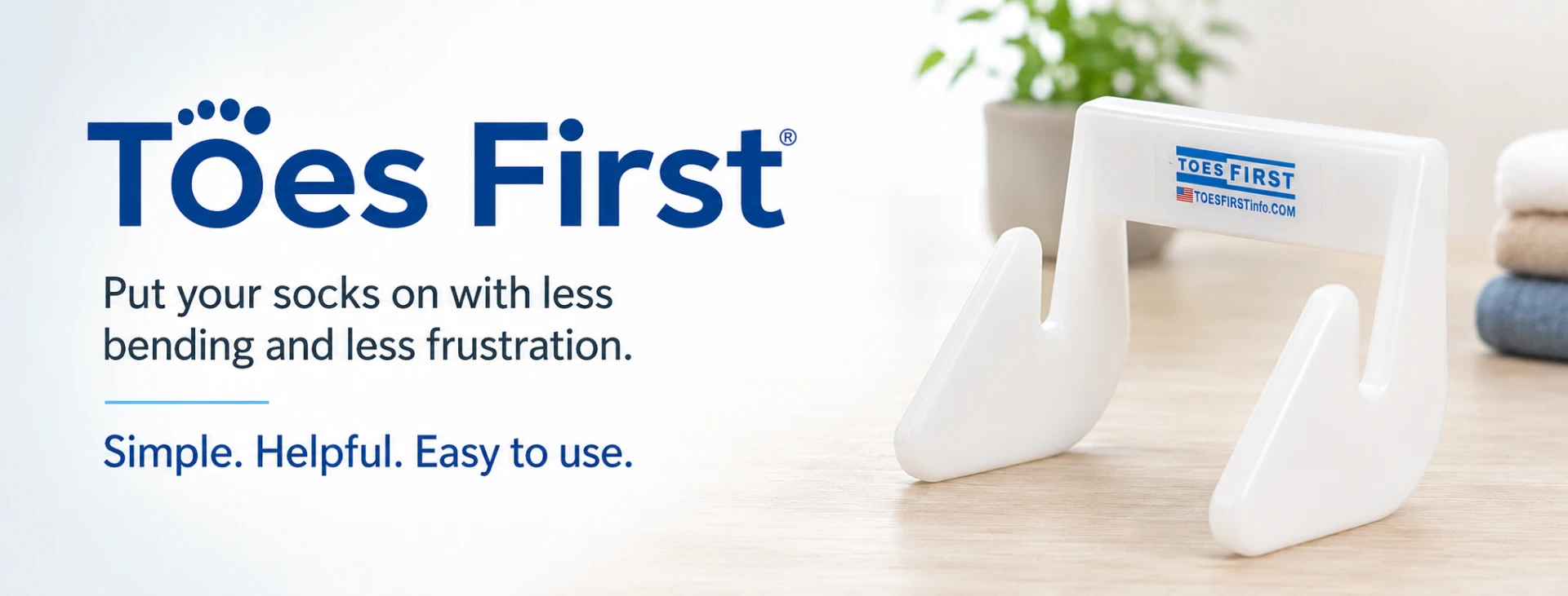 The Toes First sock-assist device on a clean countertop with the logo and tagline